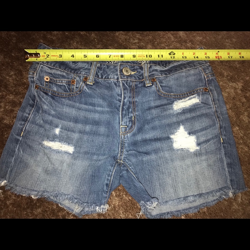 Distressed denim shorts